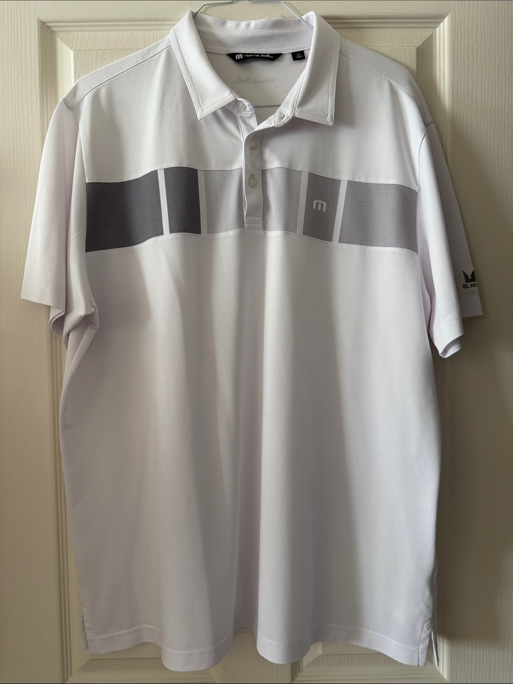 TravisMathew White Polo with Gray Chest Stripe
